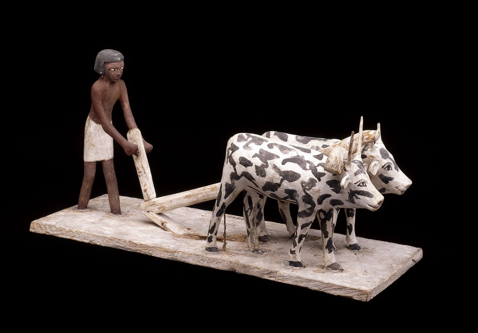 Ag of history. Wooden model of man ploughing with Oxen (Egypt, about 2040–1750 BC). Egyptian economy.