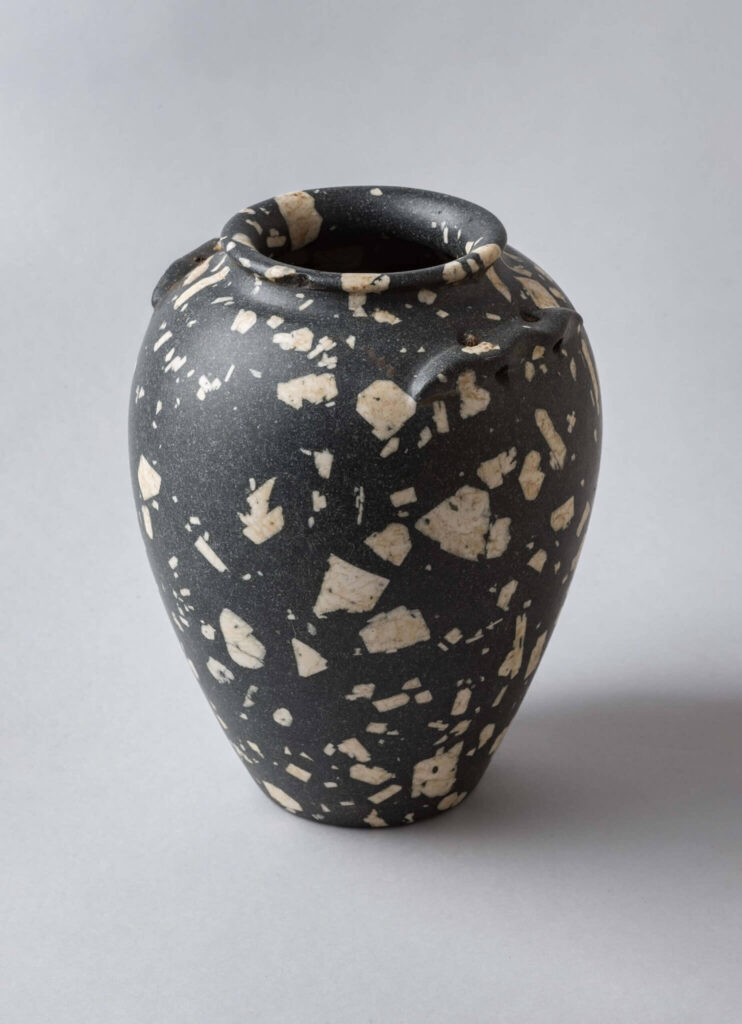 Andesite porphyry jar with wavy handles