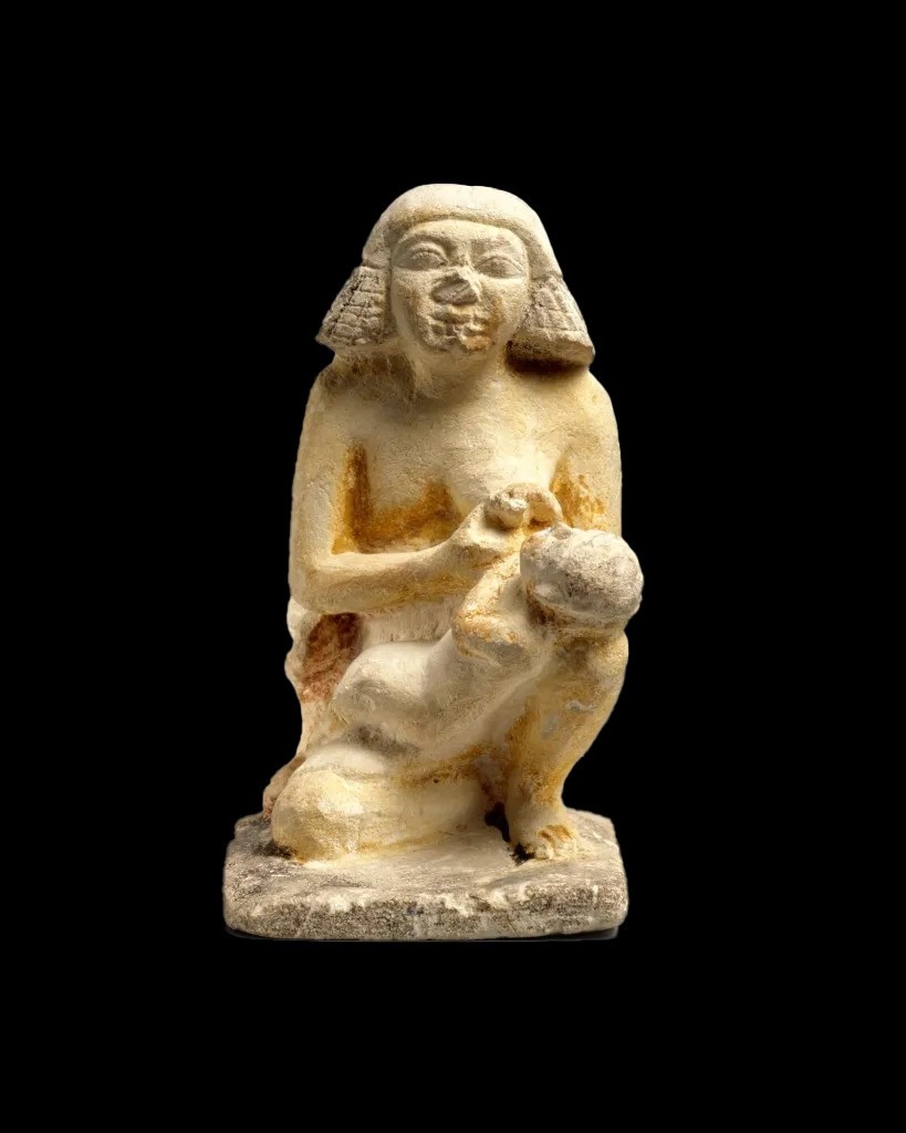 Statue of a Nursing Woman - Egypt Museum