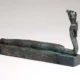 The coffin adorned with the human-headed part-eel, part-cobra imagery linked to Egyptian god Atum