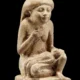 Statue of a woman with child on lap. Met Museum. 44.4.64