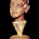 Head of Tutankhamun emerging from a lotus flower