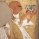 A Sem-Priest in a leopard skin shawl presents offerings